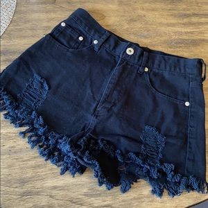 High waisted distressed fringe denim shorts